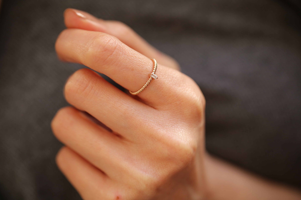 Mini Baguette Twist Sleeve Ring